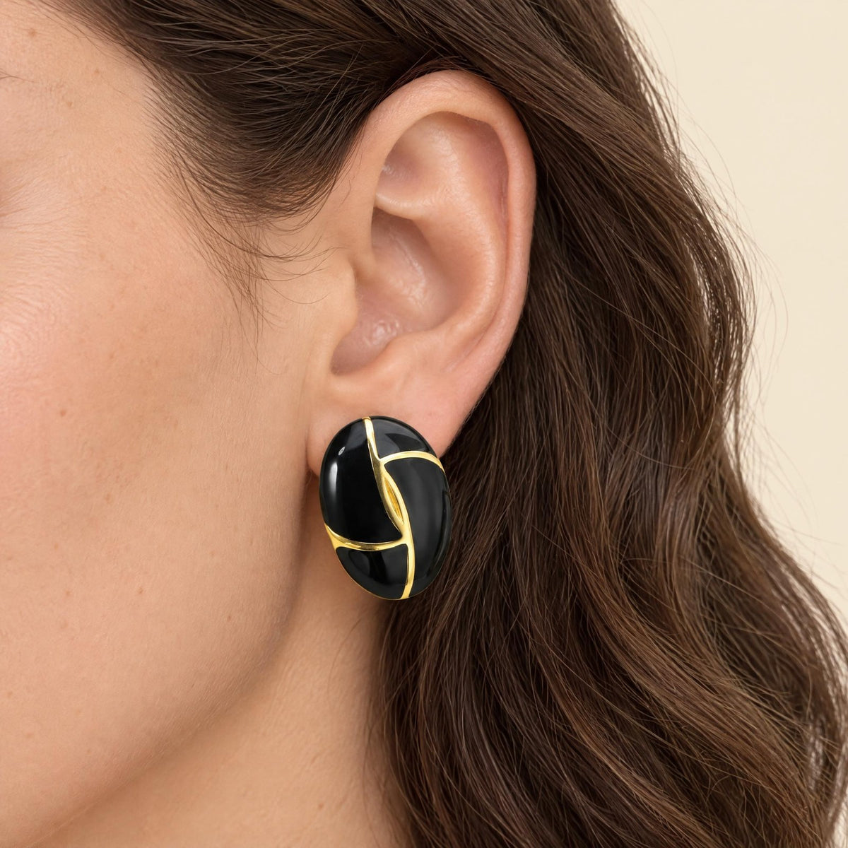 Kivi black enamel studs worn
