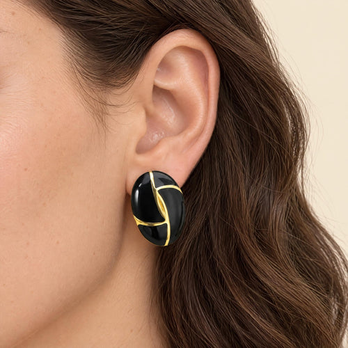 Kivi black enamel studs worn